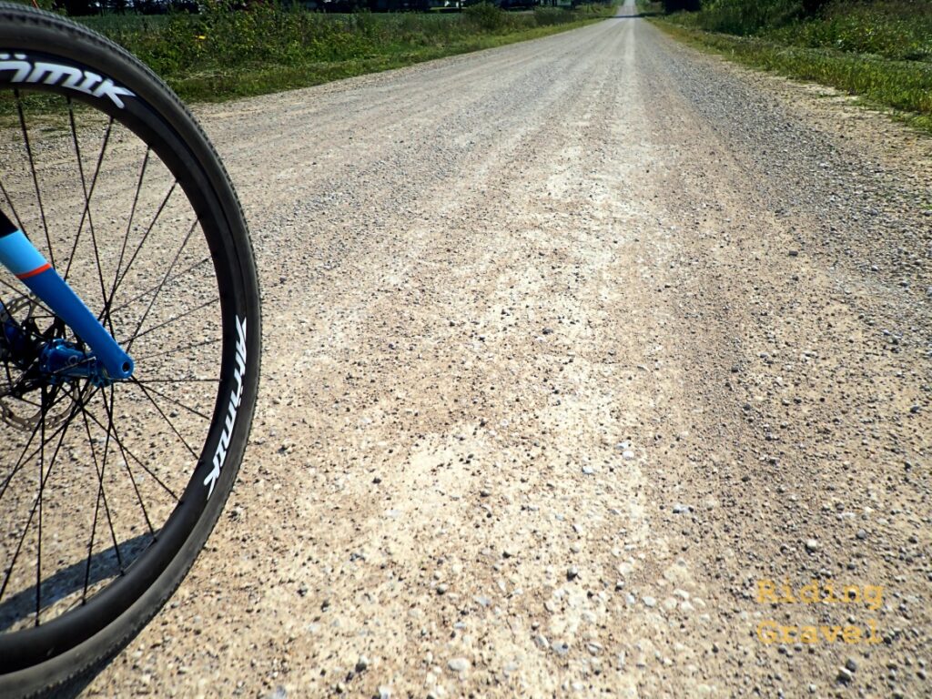 Atomik/Berd Ultimate wheel on a gravel road