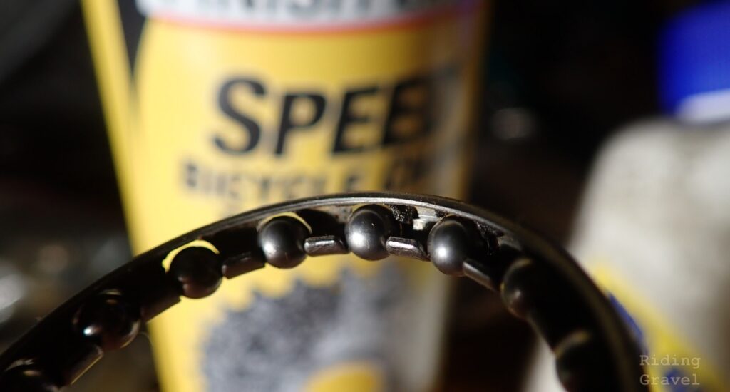 A caged bearing with Speed Degreaser in the background