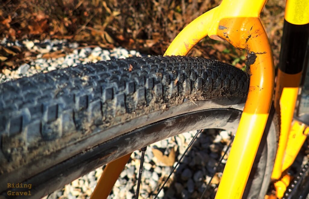 The WTB Vulpine tire detail shot on a yellow bike. 
