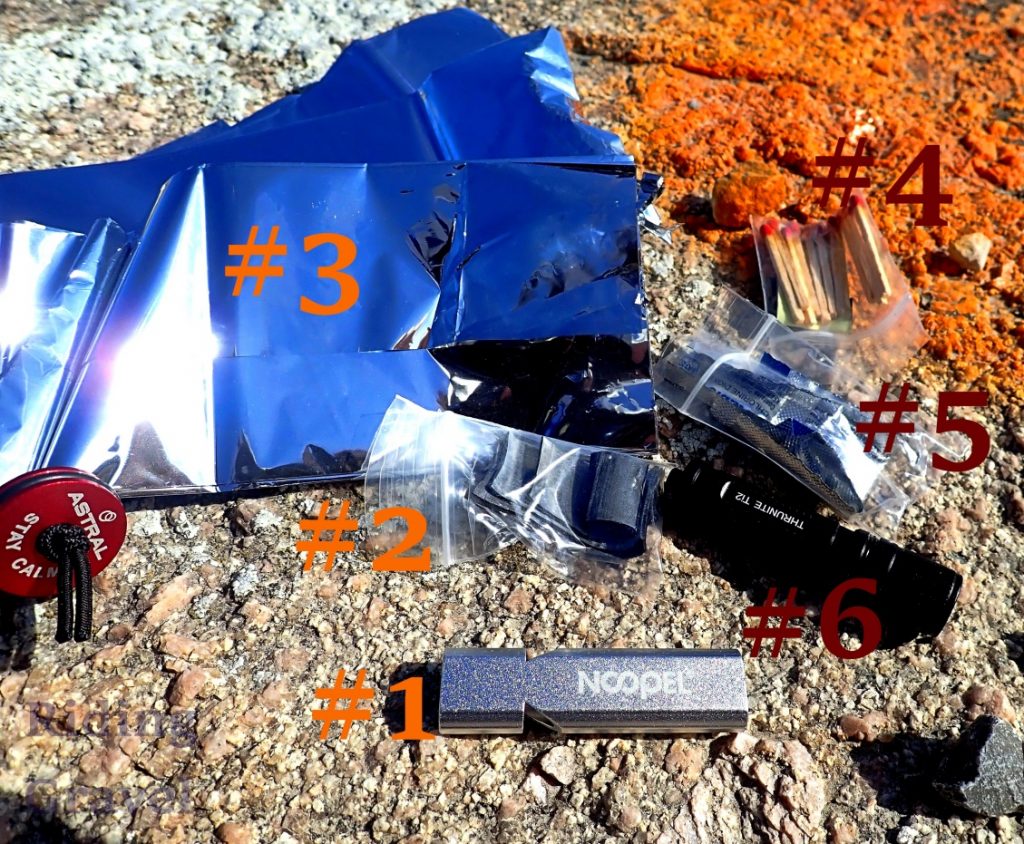Contents of the Astral O.N.S. Seatpost on a rock enumerated for ID.