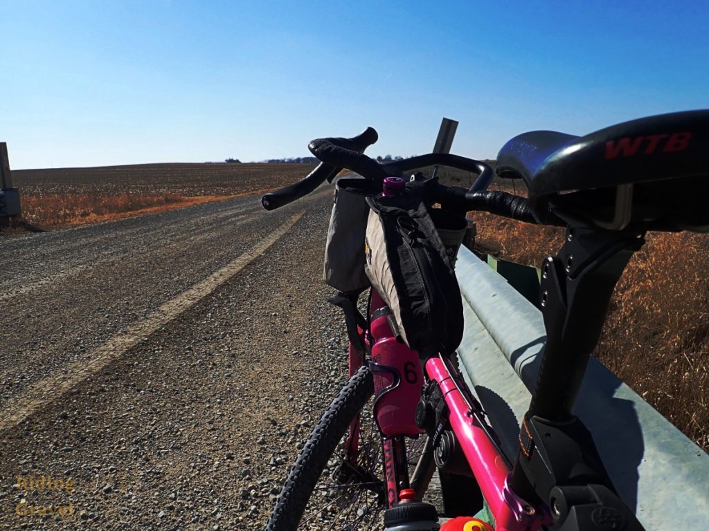 A rear 3/4's view of GT's bicycle in a rural area.