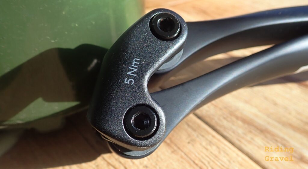 A detail shot of the Ergon CF Allroad seat post's Flip Head clamp.