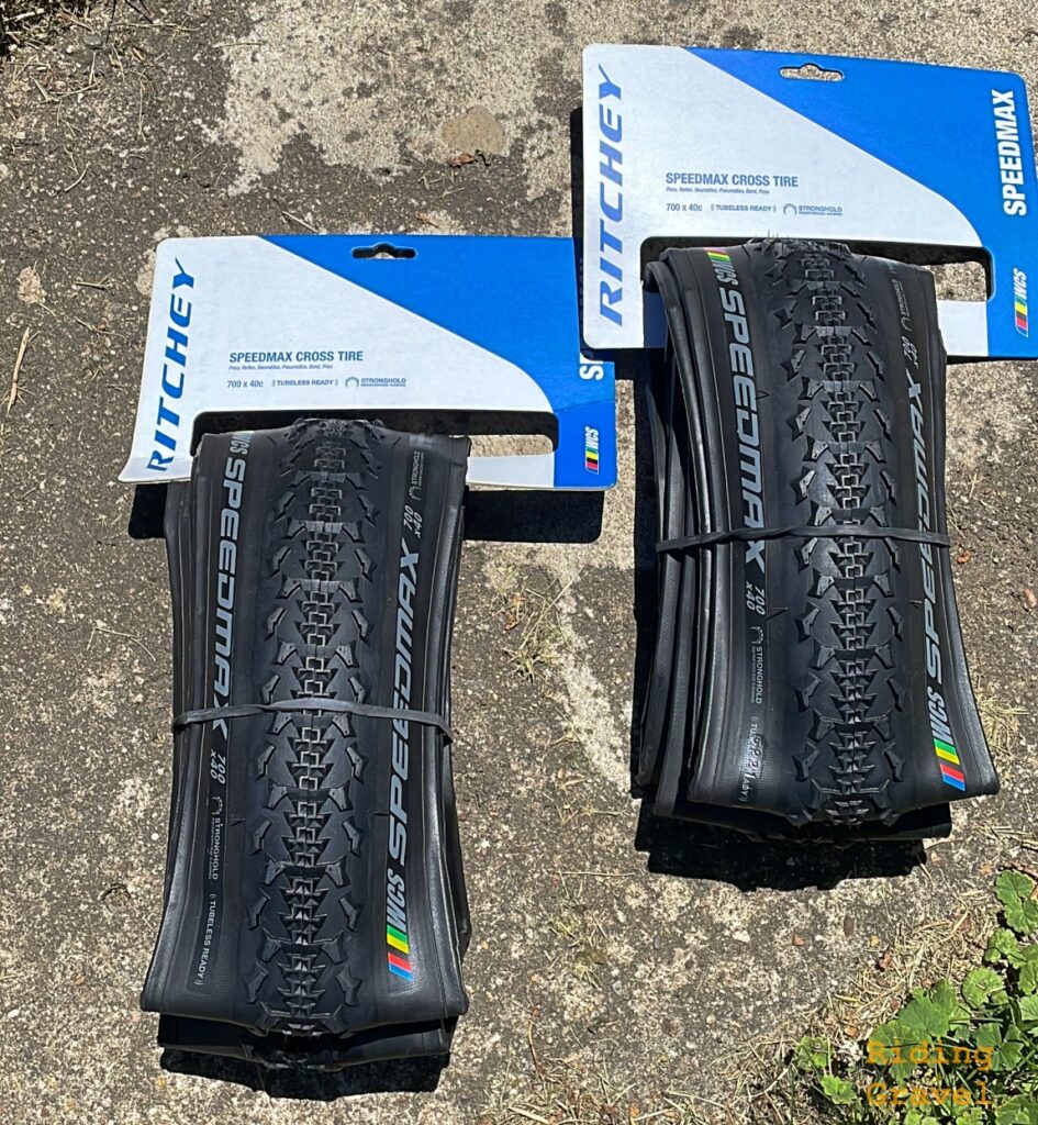 Image of the Ritchey Design Speedmax tires in retail packaging on a cement slab