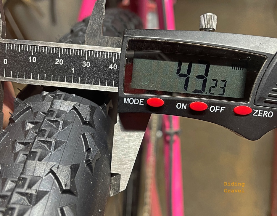 A close-up of a digital calipers on a Ritchey Speedmax WCS 700 X 40mm tire. 