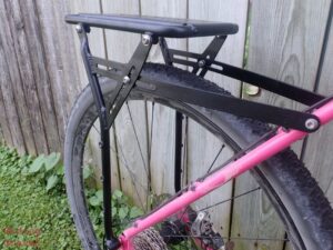 Close up of the OMM Elkhorn Rack on GT's pink BMC bicycle. 