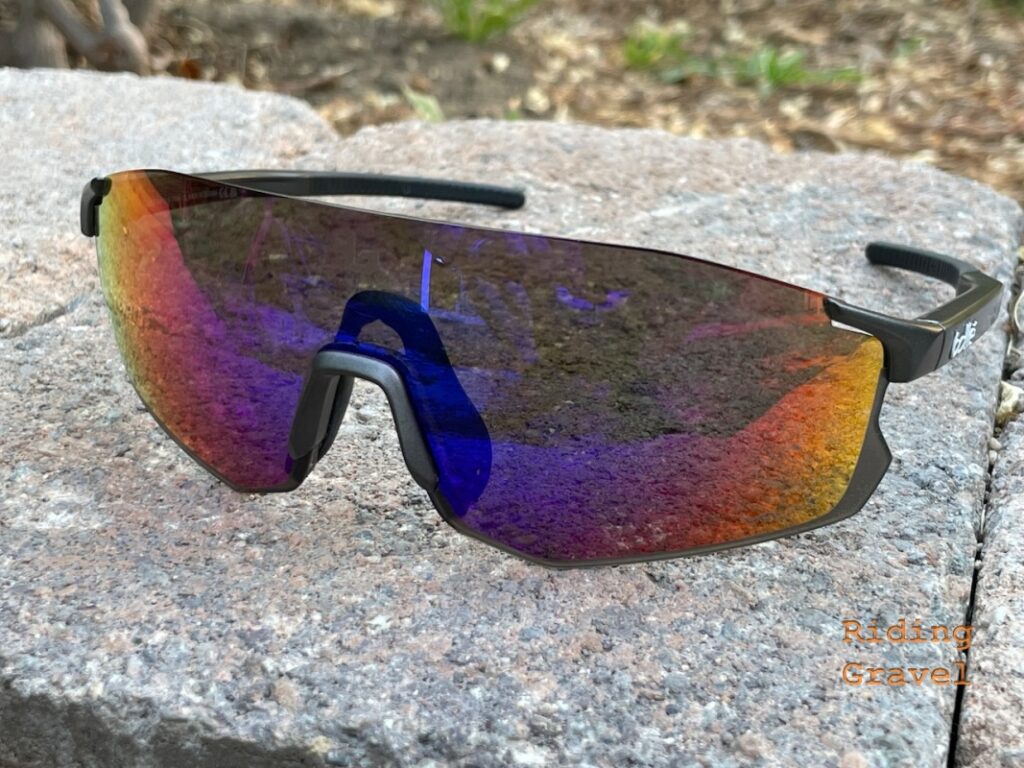 The Bolle' Volt glasses on a rock