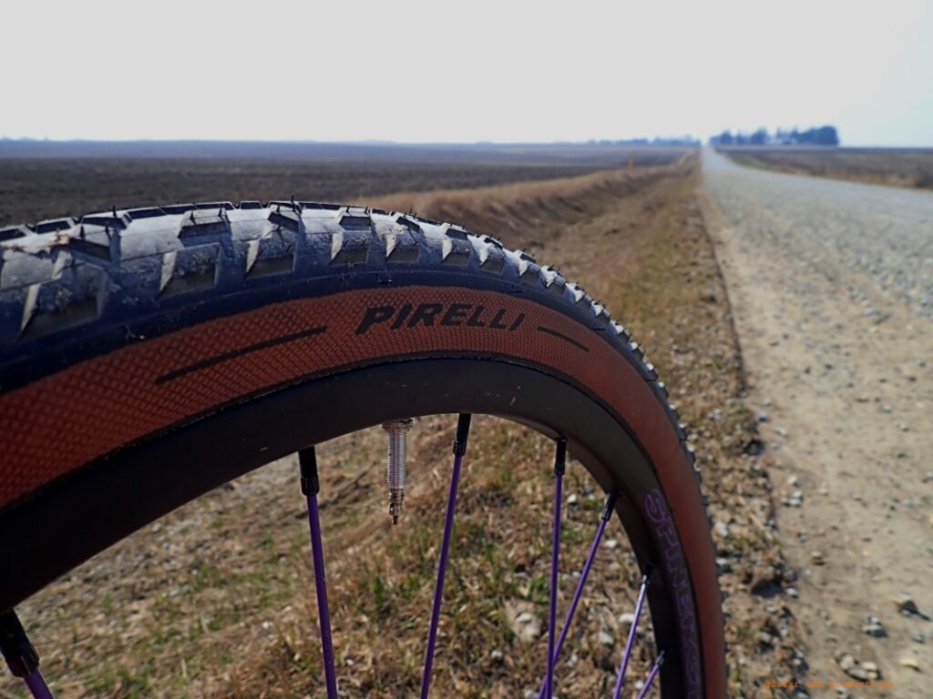 Pirelli tire and rural scene.