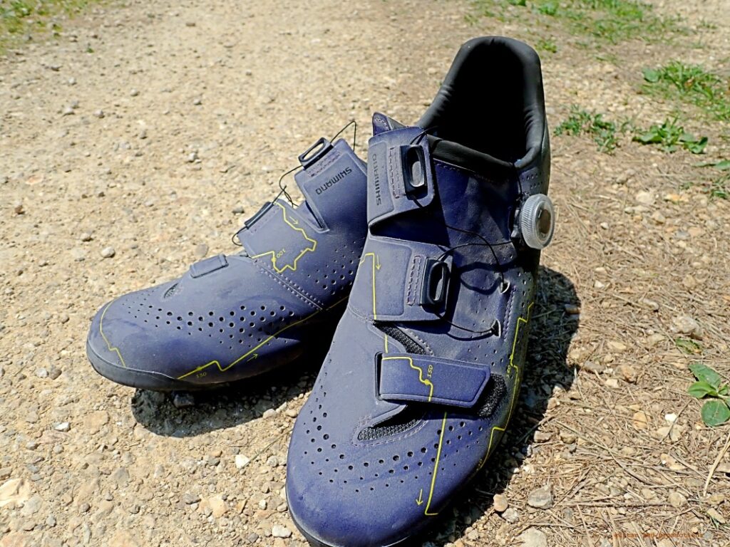 Shimano RX6 gravel shoes on a gravel two-track road. 