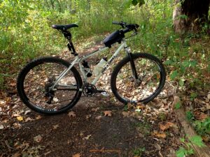 The X Country Bar as mounted to GT's 29"er in a wooded setting.